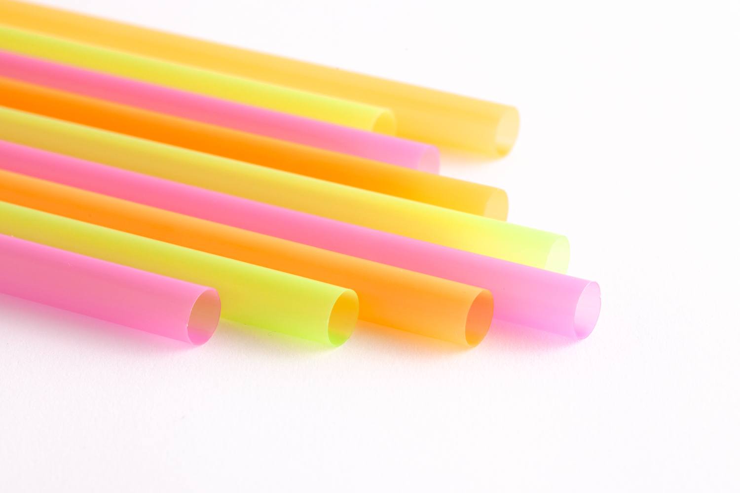 multi-coloured straws lined up side by side