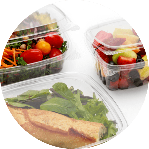3 clear food containers with sandwich, salad, and fruit salad