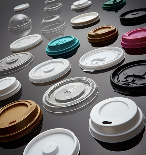 rows of drinking cup lids for coffee, juice, tea, water